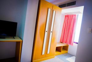 TV a/nebo společenská místnost v ubytování Sweet Home Hotel Betong + 8 fotografií