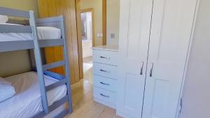 Uma cama ou camas num quarto em Harbour View, Mullaghmore, Sligo