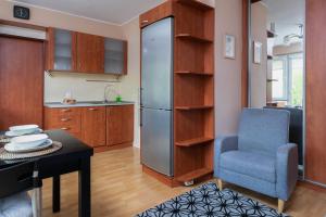 Kuchyňa alebo kuchynka v ubytovaní Gdansk Zabianka Sztormowa Apartment with 1 Bedroom by Noclegi Renters