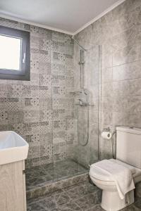 Koupelna v ubytování Keros Escape Residencies