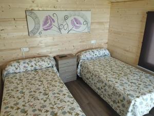 Lova arba lovos apgyvendinimo įstaigoje Camping Fraga Balada