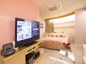 A television and/or entertainment centre at HOTEL xcell