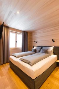 Postel nebo postele na pokoji v ubytování Chalet BergInsel