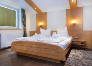 Postelja oz. postelje v sobi nastanitve Gasthof Hotel Schermer