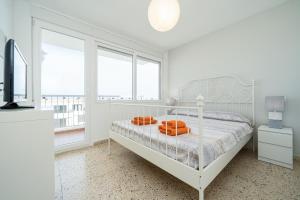 Posteľ alebo postele v izbe v ubytovaní Apartament Esmeralda