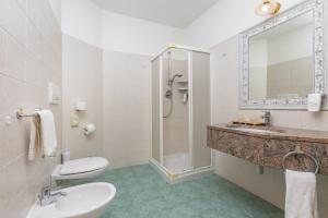 Koupelna v ubytování Hotel Vittoria - Ricarica l'anima