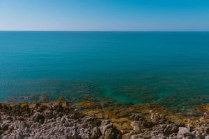a view of the ocean from a cliff at Taliammari in Cefalù