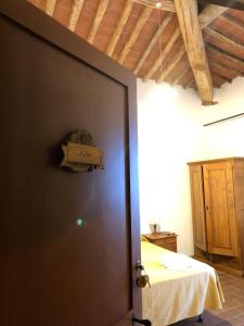 Posteľ alebo postele v izbe v ubytovaní Agriturismo Diffuso Monte Oliveto Maggiore