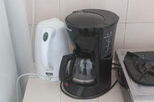 Fasilitas pembuat kopi dan teh di Auberge Miko