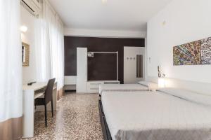 Postel nebo postele na pokoji v ubytování B&B Moresco