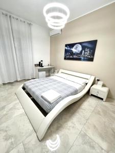 Кровать или кровати в номере Circeo Boutique Rooms