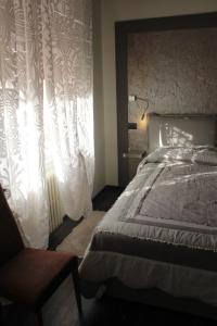 Postel nebo postele na pokoji v ubytování Villa Mirella