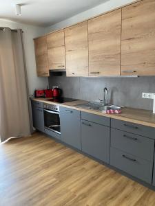 Kjøkken eller kjøkkenkrok på Appartements by Chalet Reiteralm - SKI-IN SKI-OUT