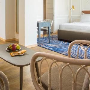 Postel nebo postele na pokoji v ubytování Swiss-Belinn Singkawang