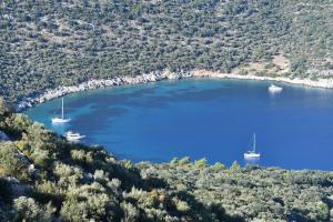 an aerial view of a large lake with boats in it at Happy Hotel Kalkan in Kalkan