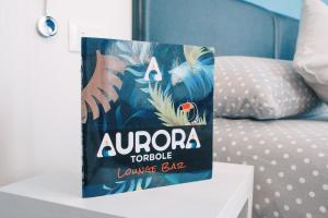 Voodi või voodid majutusasutuse Hotel Aurora & Appartamenti toas