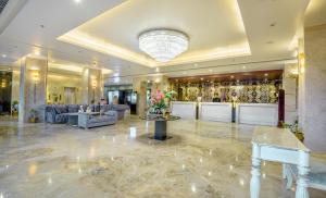 Et opholdsområde på Golden Tulip Jaipur Kukas