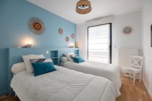 Posteľ alebo postele v izbe v ubytovaní Appartement moderne pour 4 à deux pas de la plage