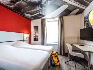 Krevet ili kreveti u jedinici u objektu Ibis Styles Strasbourg Centre Gare