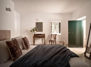 Φωτογραφία από το άλμπουμ του Dounias Village Home - Traditional Architecture & Modern Luxury στο Κορίθι