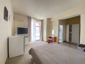 TV a/nebo společenská místnost v ubytování Hotel Class