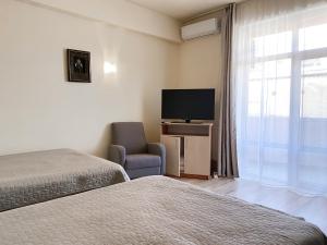 TV a/nebo společenská místnost v ubytování Hotel Class