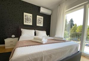 Posteľ alebo postele v izbe v ubytovaní Park view apartments