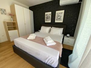 Posteľ alebo postele v izbe v ubytovaní Park view apartments