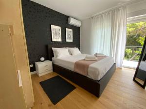Posteľ alebo postele v izbe v ubytovaní Park view apartments