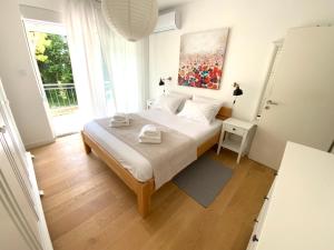 Posteľ alebo postele v izbe v ubytovaní Park view apartments