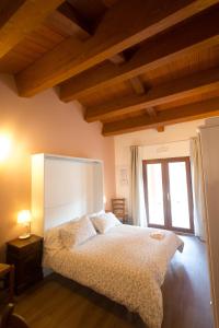 Postel nebo postele na pokoji v ubytování Albergo Diffuso Borgo Retrosi di Amatrice