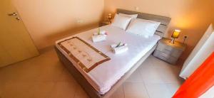 A bed or beds in a room at Dreamy Home by the Sea