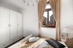 Posteľ alebo postele v izbe v ubytovaní Luxury Apartments Perko