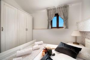 Posteľ alebo postele v izbe v ubytovaní Luxury Apartments Perko