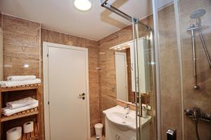 Kúpeľňa v ubytovaní CentRooms Kovac1