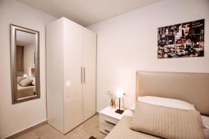 Posteľ alebo postele v izbe v ubytovaní CentRooms Kovac1