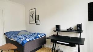 Postel nebo postele na pokoji v ubytování ApartmentInCopenhagen Apartment 1494