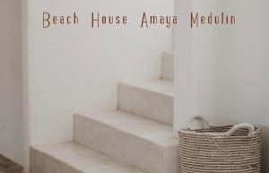 aption of stairs with a basket and a beach house amygdala melolith at Four bedroom Beach House Amaya Medulin in Medulin