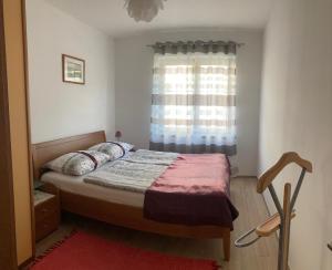 Posteľ alebo postele v izbe v ubytovaní Funtana Apartments Budinjaš