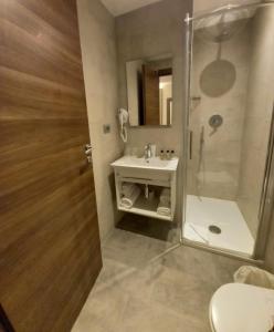 A bathroom at Excel Roma Montemario