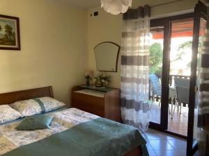 Posteľ alebo postele v izbe v ubytovaní Funtana Apartments Budinjaš