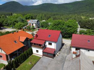 an overhead view of a house with red roofs at Plitvice Mountain Spring in Korenica