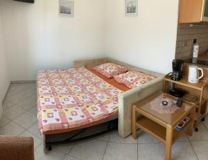 Posteľ alebo postele v izbe v ubytovaní Funtana Apartments Budinjaš