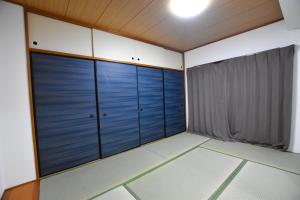 Postel nebo postele na pokoji v ubytování Randor Residence Tokyo Suites