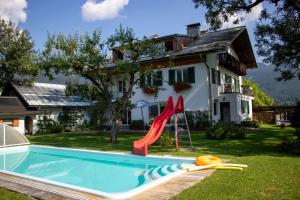 Bazén v ubytování Ferienwohnung Laserer nebo v jeho okolí