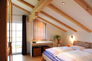 Postel nebo postele na pokoji v ubytování Appartements - Haus Sieberer