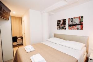 Posteľ alebo postele v izbe v ubytovaní CentRooms Kovac1