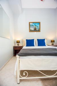 Posteľ alebo postele v izbe v ubytovaní Xenia Ionis luxury apartments