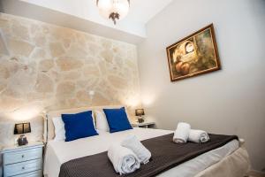 Posteľ alebo postele v izbe v ubytovaní Xenia Ionis luxury apartments