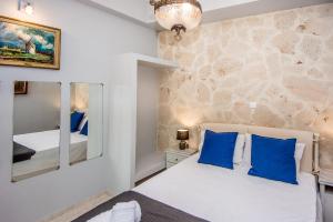 Posteľ alebo postele v izbe v ubytovaní Xenia Ionis luxury apartments
